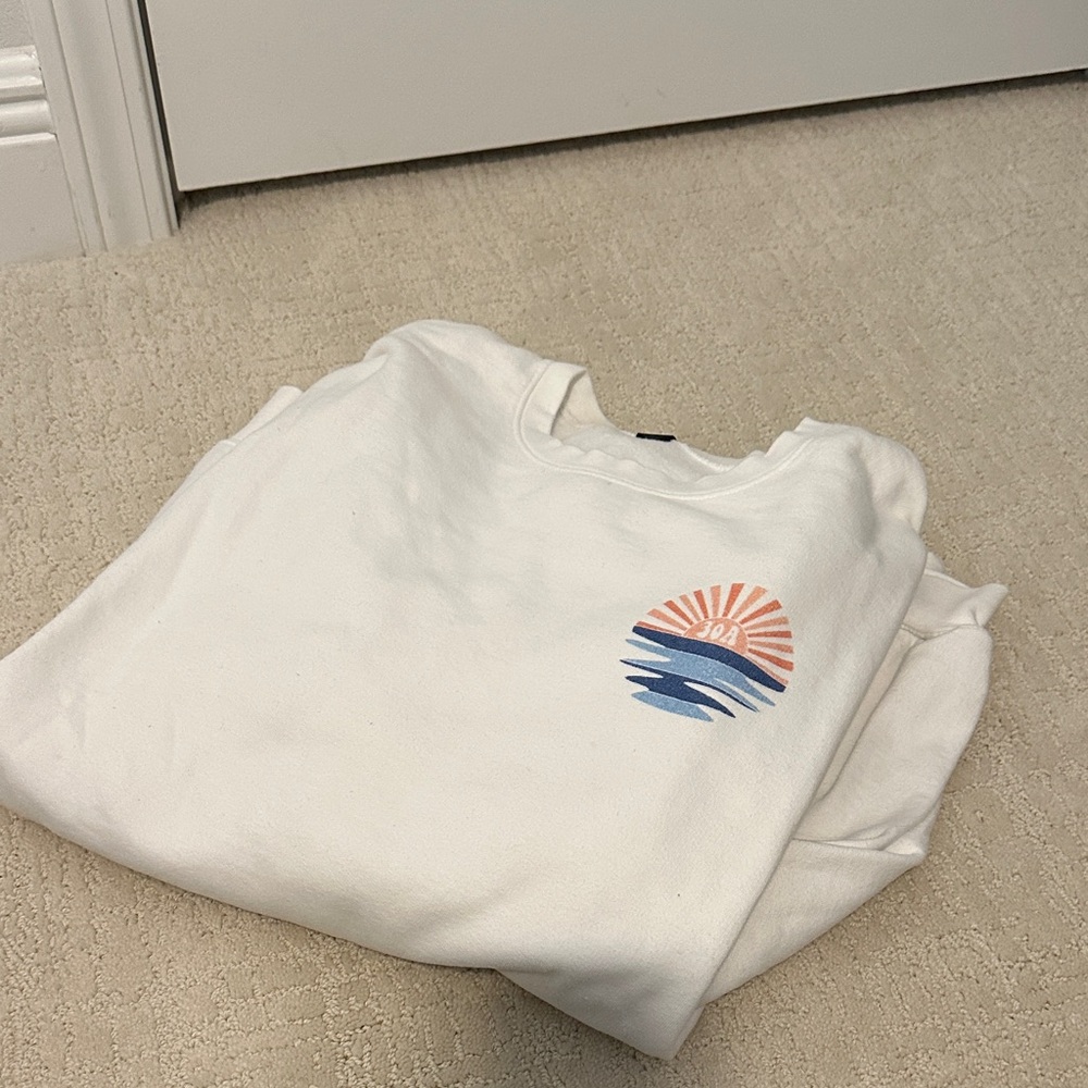 White Sweatshirt with Sunrise Graphic